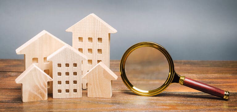 bigstock Magnifying Glass And Wooden Ho 332268367 768x364